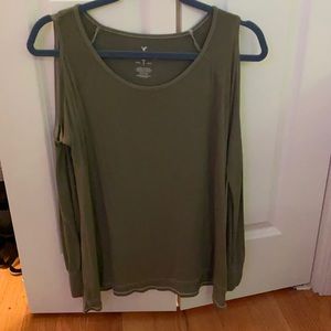 Size small light green top. Long sleeve without shoulders. Very light material.